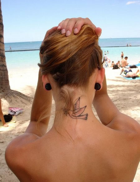 Girl With Dove Tattoo On The Neck